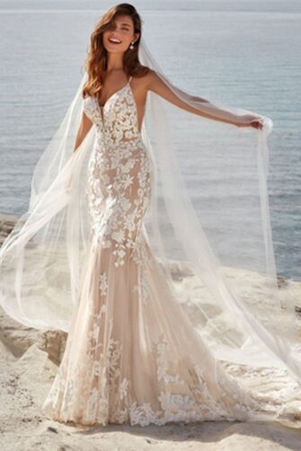 Lace-Embellished Mermaid Gown with Long Train for Beach Weddings