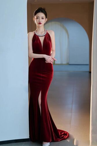 Burgundy Velvet Halter Neck Gown with High Slit – Perfect for Formal Galas and Red Carpet Events