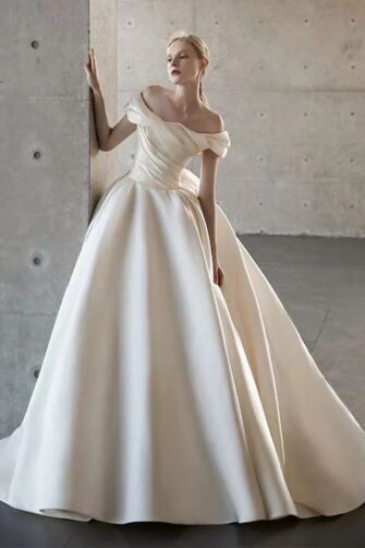 Timeless Off-Shoulder Satin Ball Gown with Graceful Draping and Elegant Full Skirt