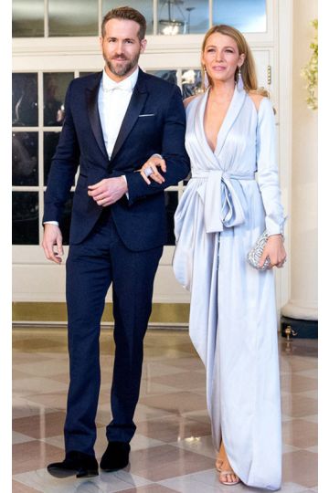 Silver Serenity – State Dinner–Inspired Silver Satin Draped V-Neck Wrap Gown