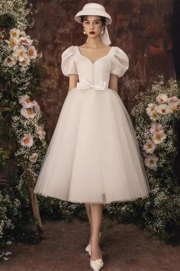 Vintage Blossom Tea-Length Dress – Puff Sleeves & Bow Detail