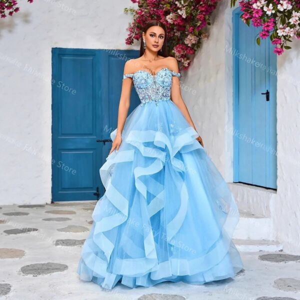 Ethereal Wave – Blue Ruffled Organza Gown with Embroidered Top