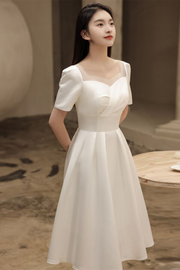 Ivory Short-Sleeve Tea-Length Dress with Sheer Neckline – Perfect for Receptions and Semi-Formal Events
