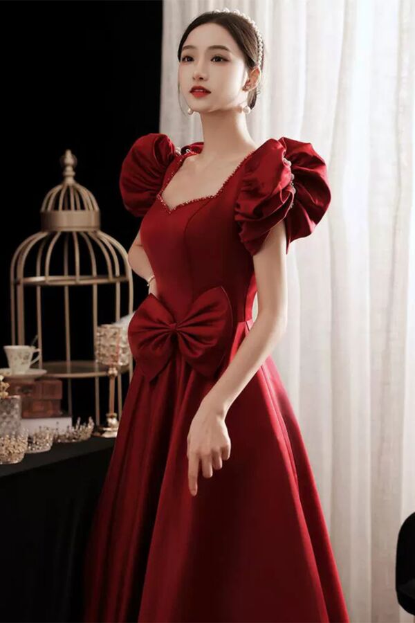 Burgundy Puff-Sleeve Bow Gown – Perfect for Weddings and Grand Occasions
